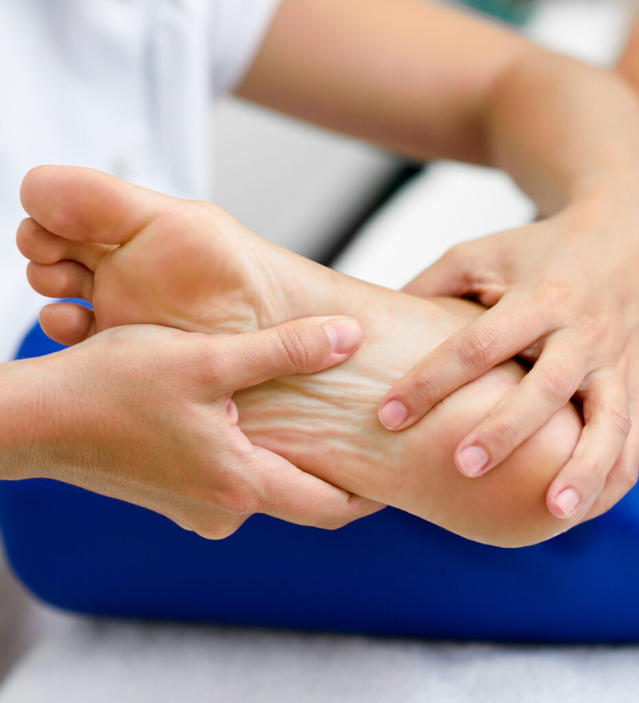 Therapist treating patient for neuropathy